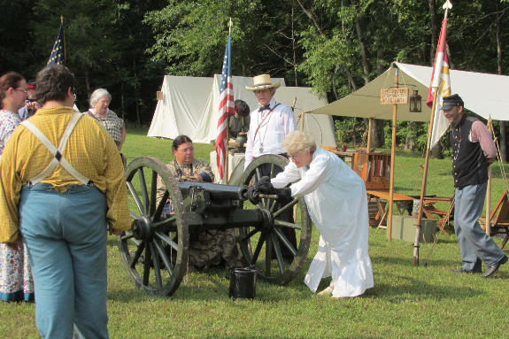 Members of Company M train ladies of the Ladies' Union Aid Society in artillery drill at the living history at Patterson, MO, August 28-30, 2015.
