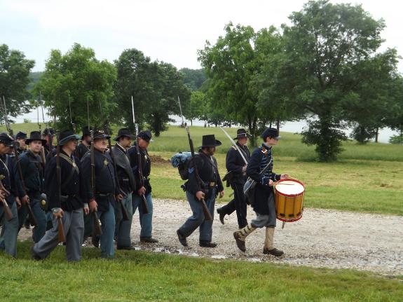 Union infantry pass in review before the crowd after a battle at the 2014 event at Pittsfield,IL.