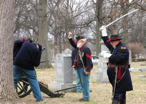 Capt. Steve Allen prepares to give the command to fire for a Company M crew at the Sherman Day ceremony at Calvary Cemetery in St. Louis, MO, February 28, 2016.