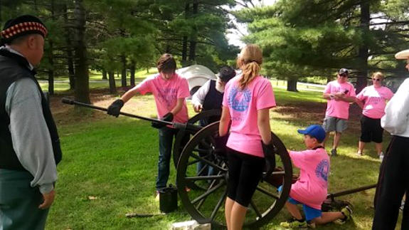 Mike McCubbins, Mike Just, and Randy Baehr drill campers from the Junior AMVETS on the Filley gun at the History Campout at Jefferson Barracks County Park in south St. Louis County, MO, on August 1, 2015.