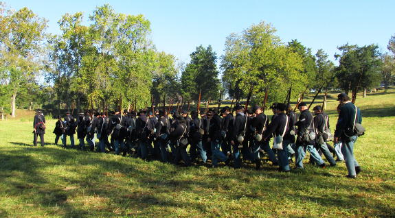 Members of Co. G march with the U.S. Muddy River Battalion during the reenactment of the Battle of Perryville at the Perryville Battlefield State Historic Site in Kentucky October 7-9, 2016.