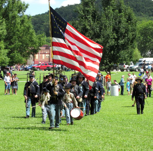 Company G's colors lead the Union infantry back to camp after the Saturday battle at the Old Settlers' Day event in Waynesville, MO, July 30-31, 2016.